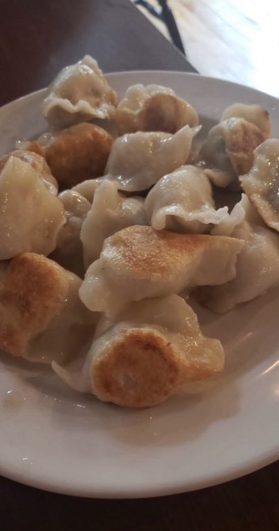 Best of both, Half steamed, half pan-fried: when you can't choose, get both.